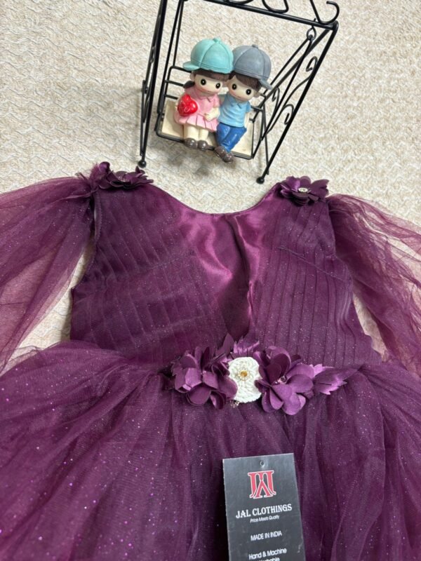 Beautiful Purple Baby Dress in Soft Net Fabric Inclined view