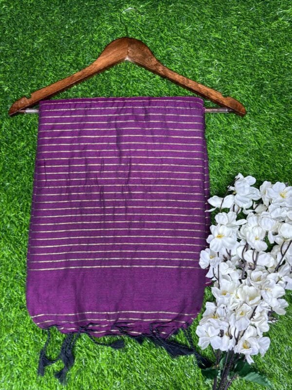 Image 2025-02-09 at 2.42.52 PM (27) Khadi Saree a purple scarf on a swinger with white flowers