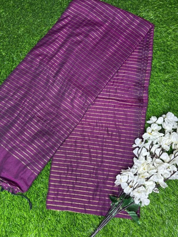 Image 2025-02-09 at 2.42.52 PM (28) Khadi Saree a purple scarf with gold stripes and white flowers on grass